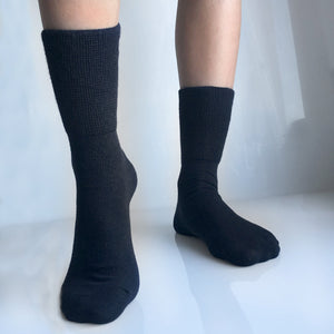 PAKKE med sorte "no elastic" sokker i bomull • strammer ikke