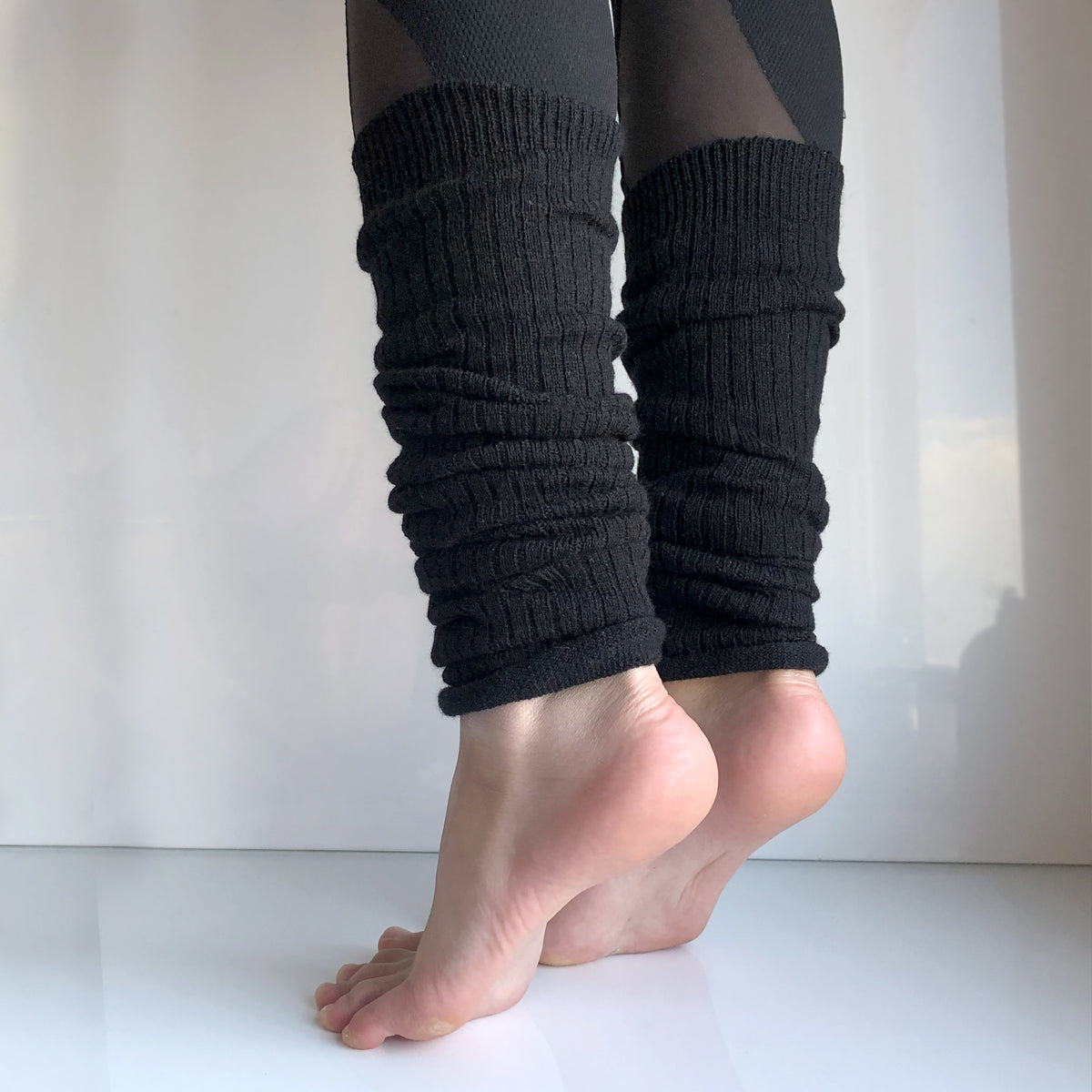 Sorte leggvarmere med ull - Lindex -  "Leggings"